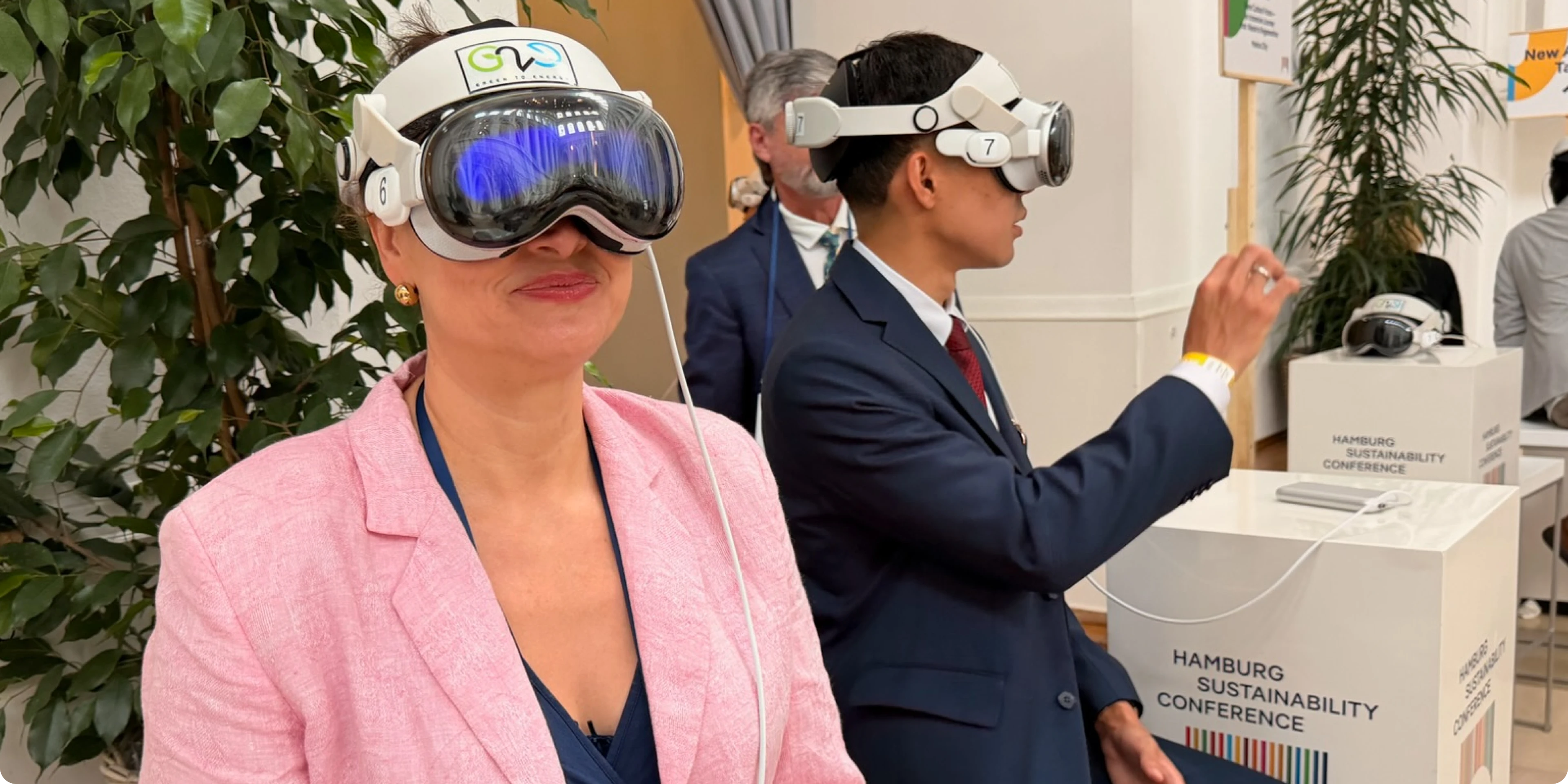 Attendees wearing Apple Vision Pro headsets at an immersive Spatial Creative showcase