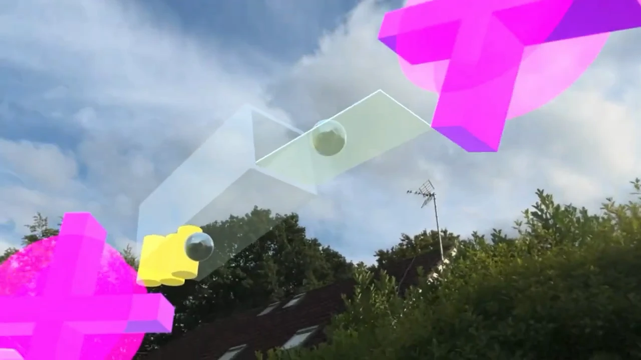 Translucent geometric shapes and spheres floating above a real house and trees in an early STAGEit experiment